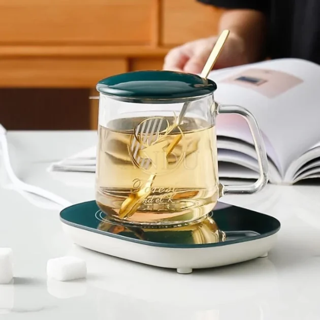 كوب شفاف حراري مع قاعدة تسخين كهربائية.جهاز وكأس التسخين شفاف